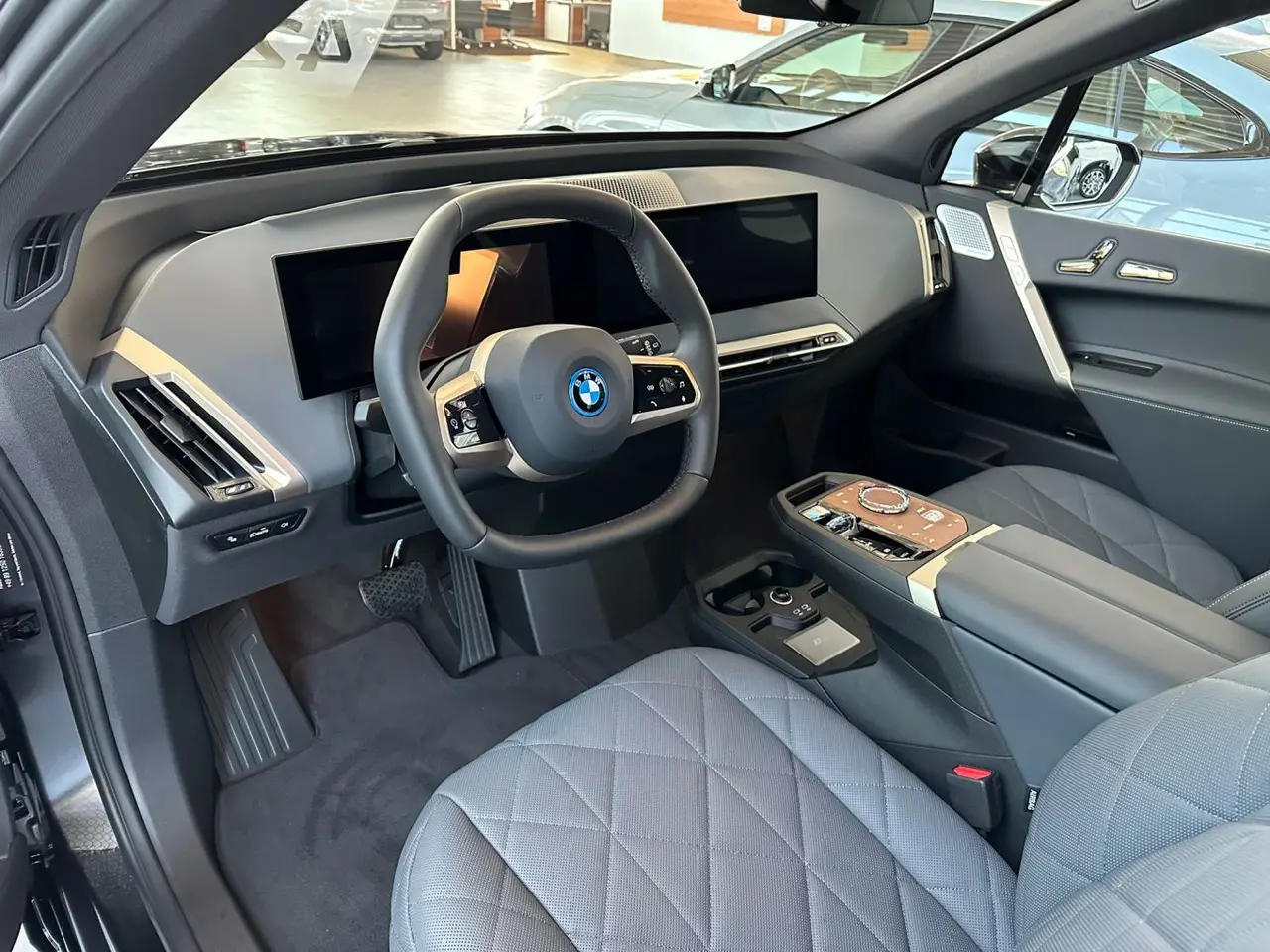 BMW IX M60 2023, exterior — Ibiza Luxury Car Rental, Ibiza. BMW IX M60 in Ibiza A BMW IX M60 rental in Ibiza combines 619 horsepower with a refined…