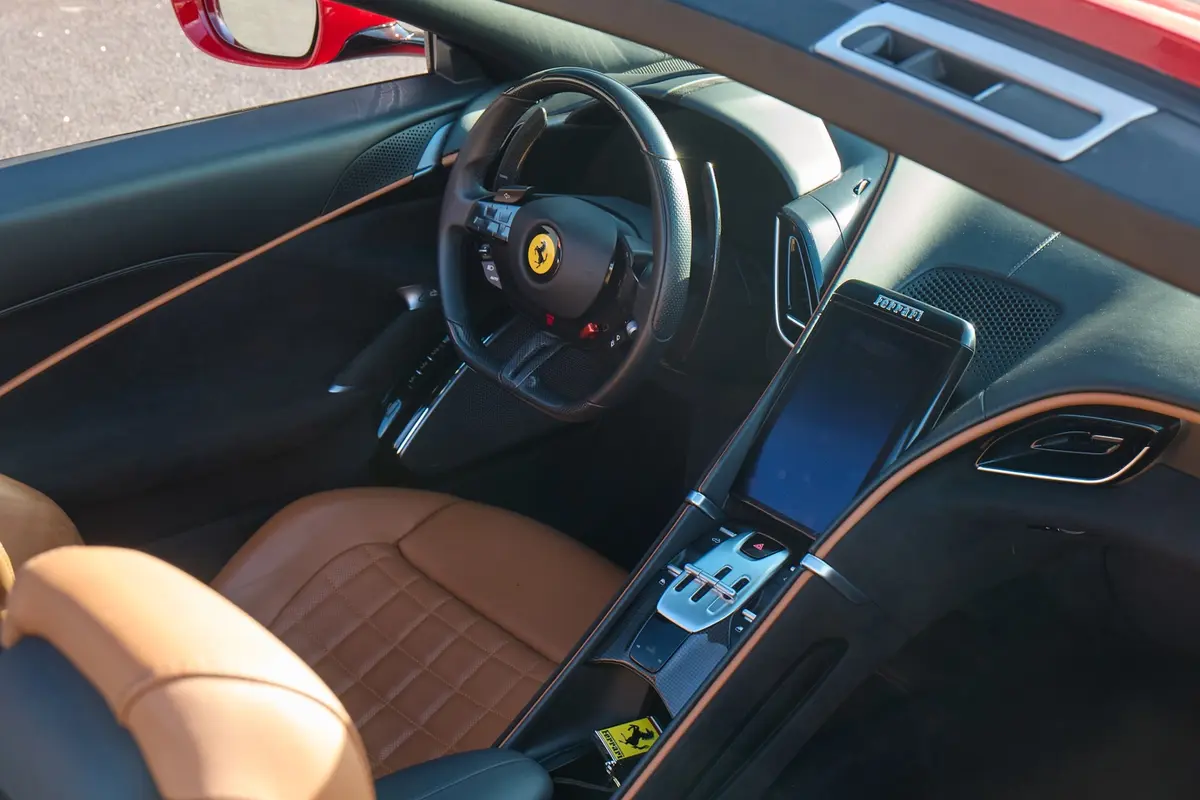Ferrari Roma Spider 2024, rear view — Ibiza Luxury Car Rental, Ibiza. Ferrari Roma Spider in Ibiza A Ferrari Roma Spider rental in Ibiza pairs 620 horsepower…
