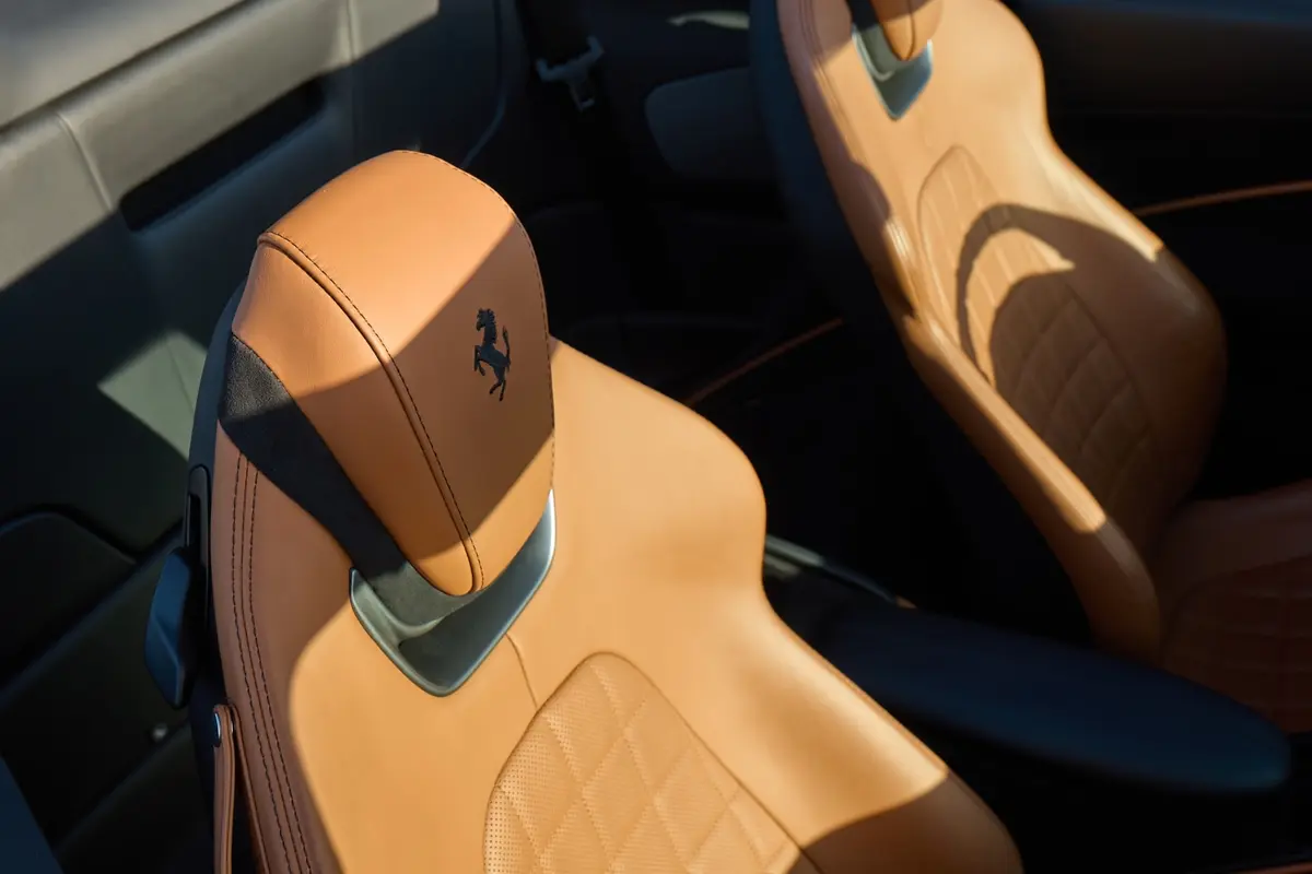 Ferrari Roma Spider 2024, interior — Ibiza Luxury Car Rental, Ibiza. Ferrari Roma Spider in Ibiza A Ferrari Roma Spider rental in Ibiza pairs 620 horsepower…