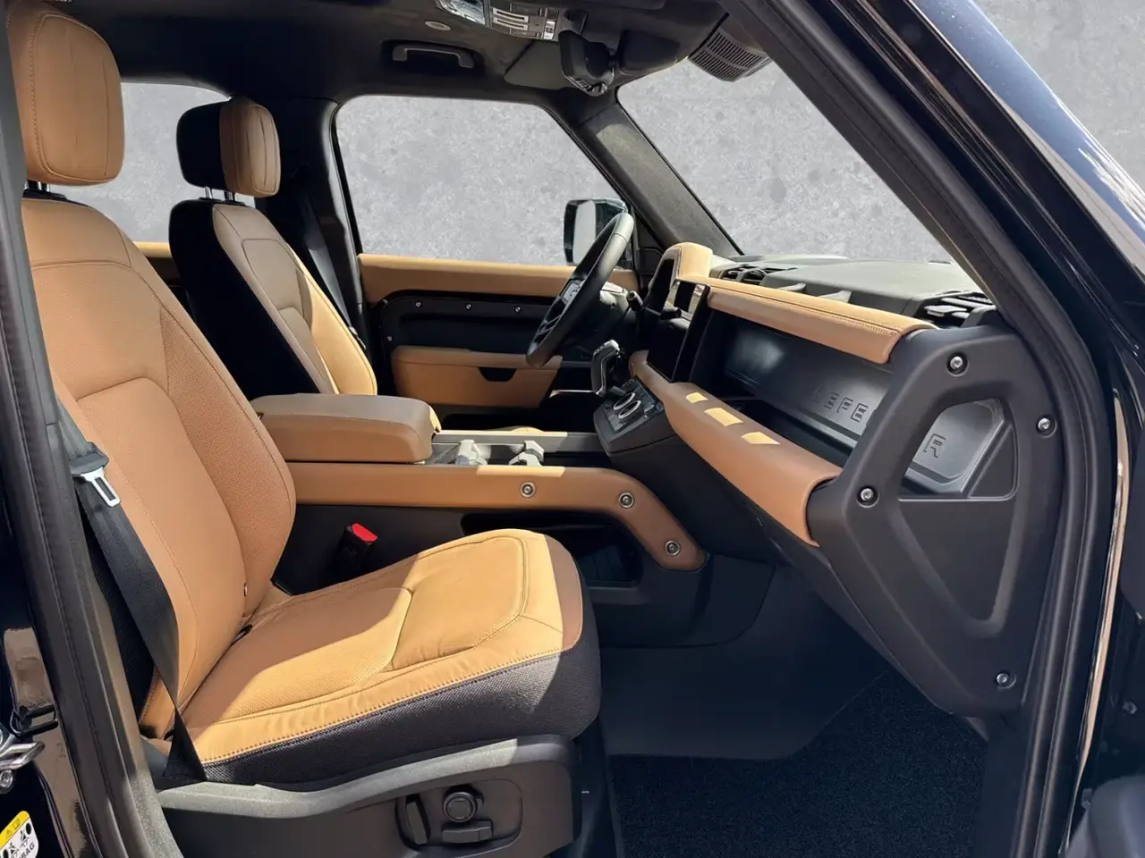 Land Rover Defender 2024, front view — Ibiza Luxury Car Rental, Ibiza. Land Rover Defender in Ibiza A Land Rover Defender rental in Ibiza delivers 400…