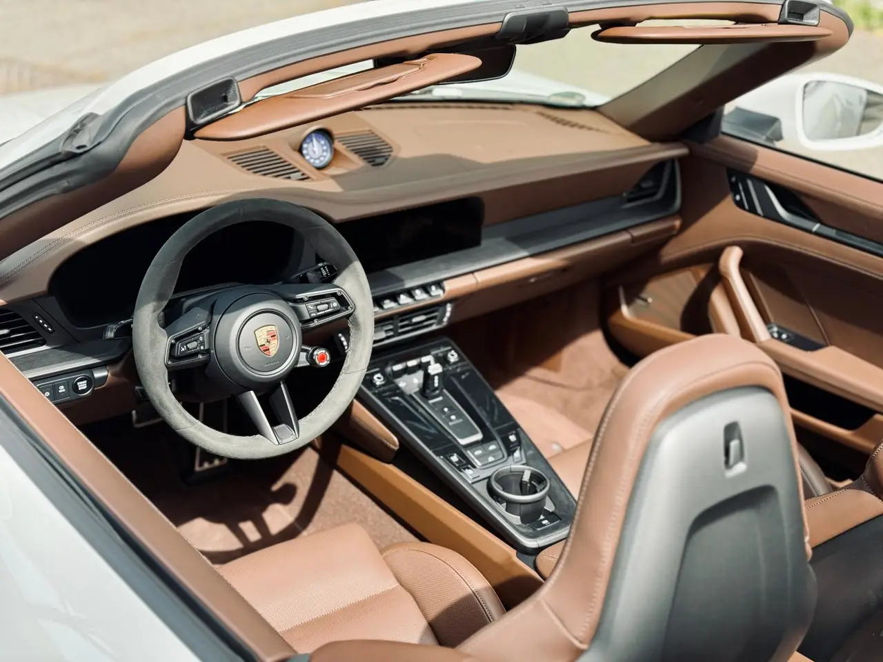 Porsche 992.2 Carrera 4 GTS Cabrio 2025, interior — Ibiza Luxury Car Rental, Ibiza. Porsche 992.2 Carrera 4 GTS Cabrio in Ibiza A Porsche 992.2 Carrera 4 GTS Cabrio hire in…