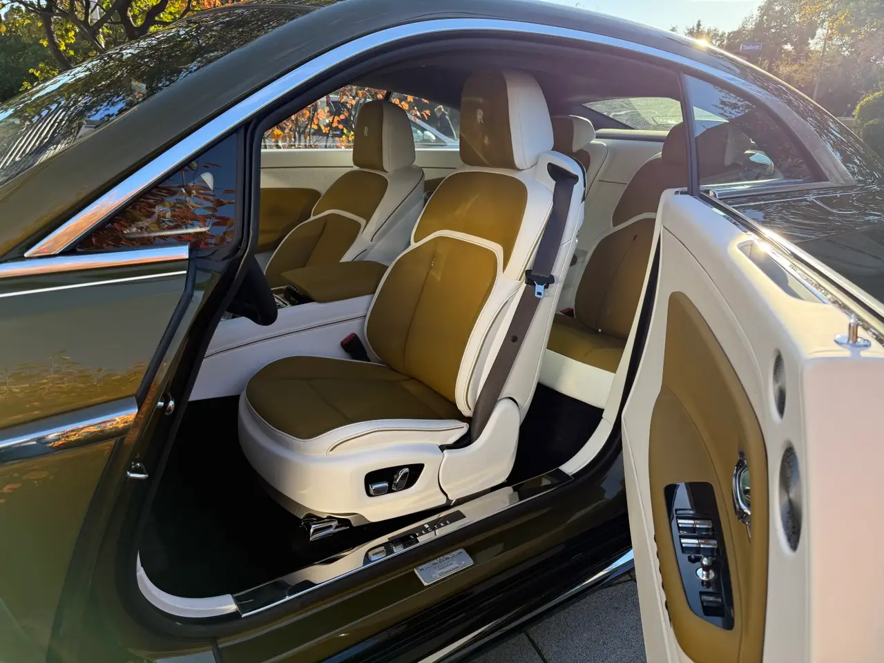 Rolls-Royce Spectre 2024, rear view — Ibiza Luxury Car Rental, Ibiza. Silent power on the clifftops above Cala d'Hort